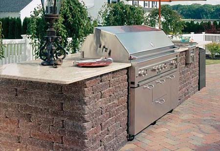 Outdoor kitchen for slide-in grill