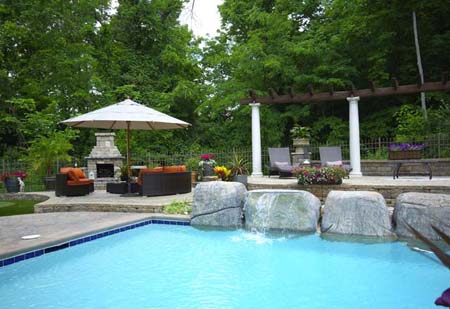 Pool patio with stone fireplace